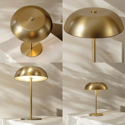Brass-finish cordless mushroom table lamp with a rounded dome shade.