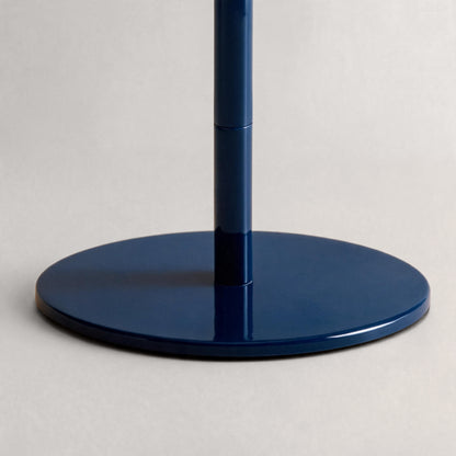 Glossy navy cordless mushroom table lamp base and adjustable stem detail