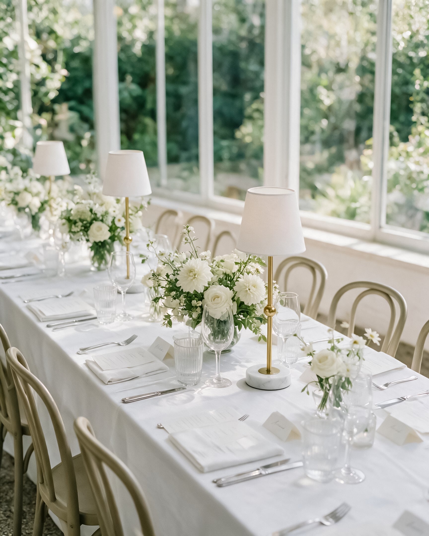 White cordless table lamps decorating an elegant banquet table