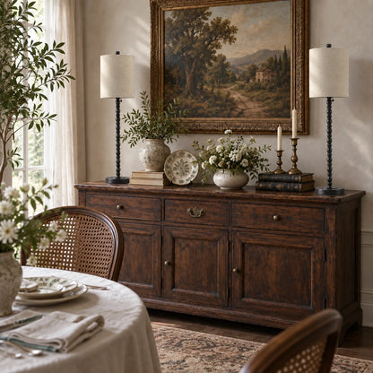 Two Lampworks matte black spindle buffet lamps styling a rustic dining room sideboard