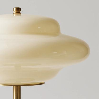 Close-up of the milky white opal glass shade and curved saucer profile on a Lampworks table lamp